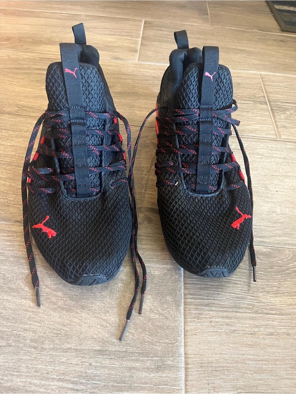 Puma Black Sneakers with Red Accent Logos